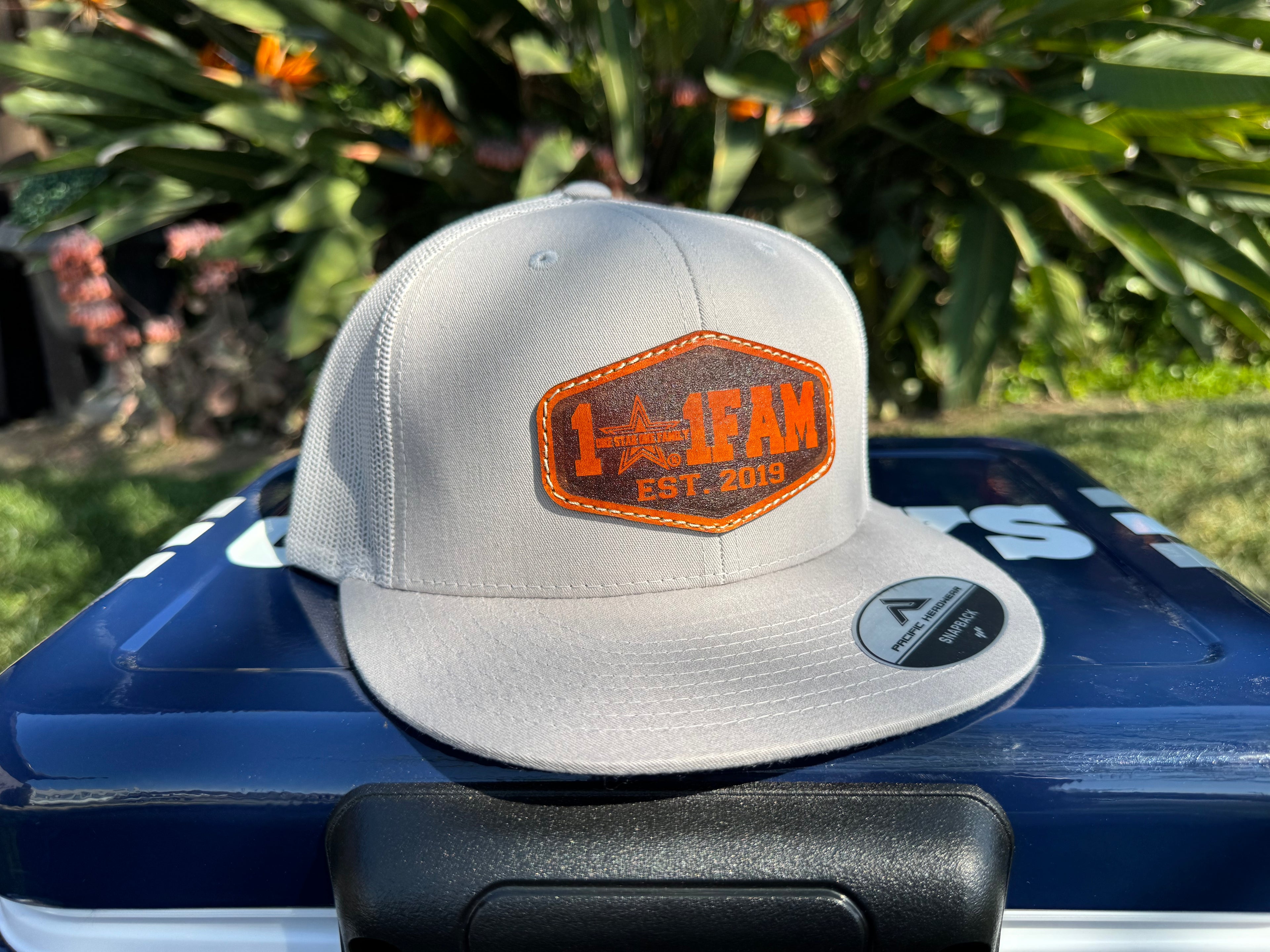 Leather patch snapback hat